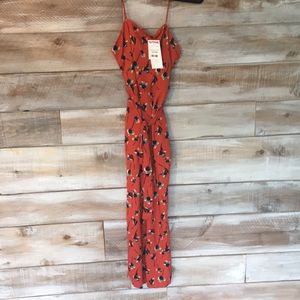 Red jumpsuit with flowers